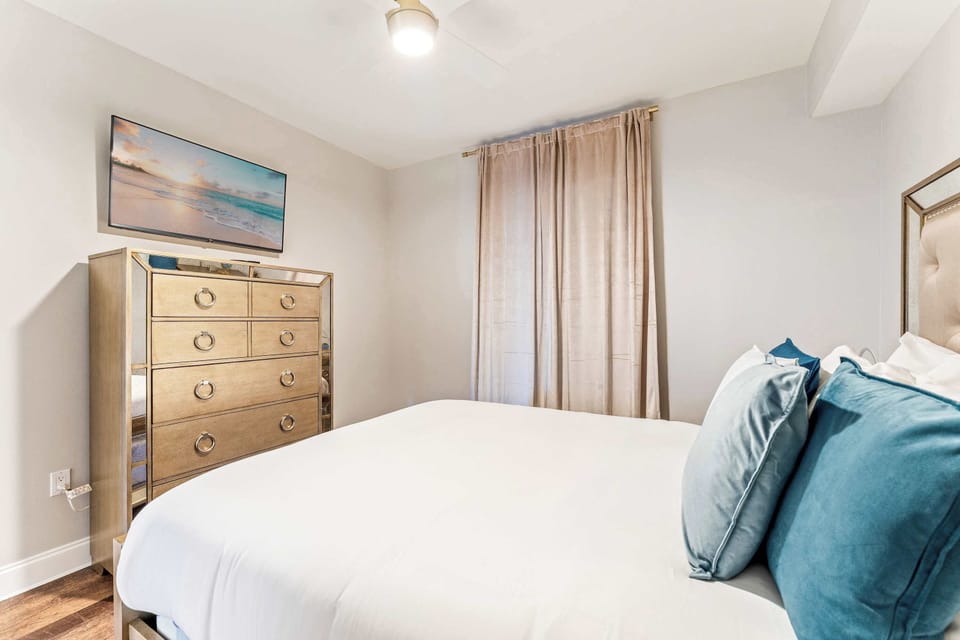Bedroom 2 with queen bed and Smart TV