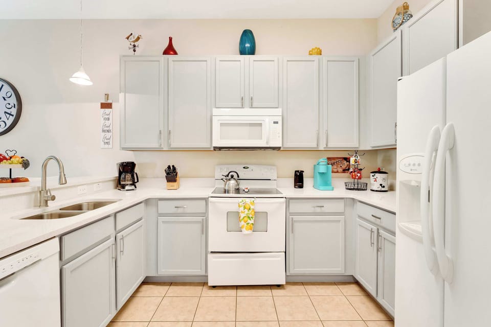 The open, airy kitchen offers ample space & all the comforts of home