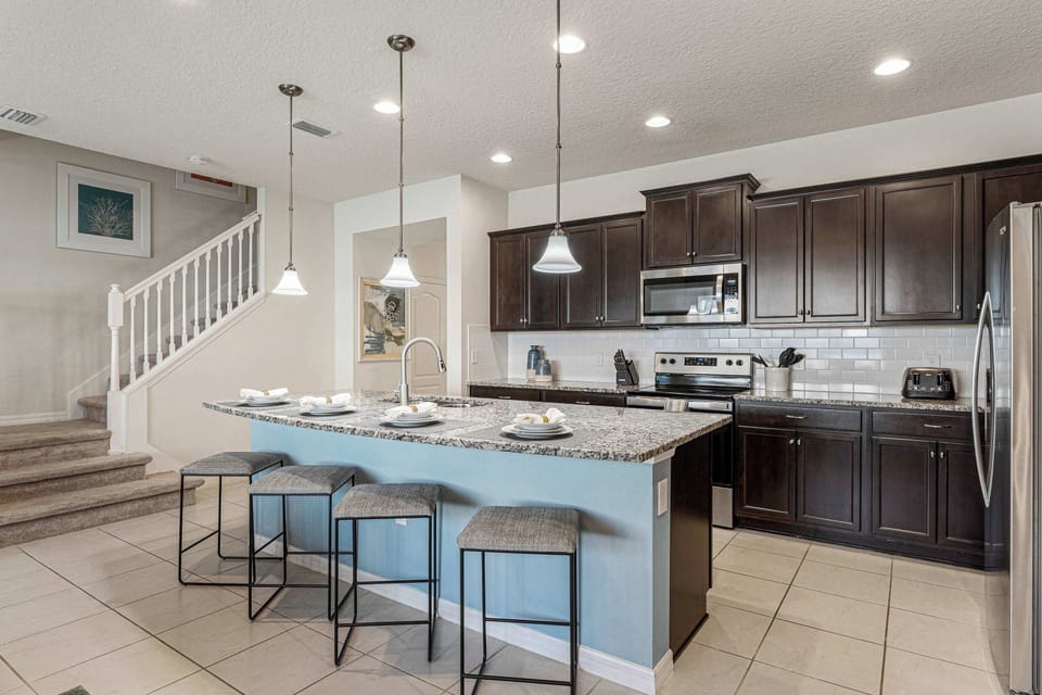 The updated kitchen offers loads of space & all the comforts of home