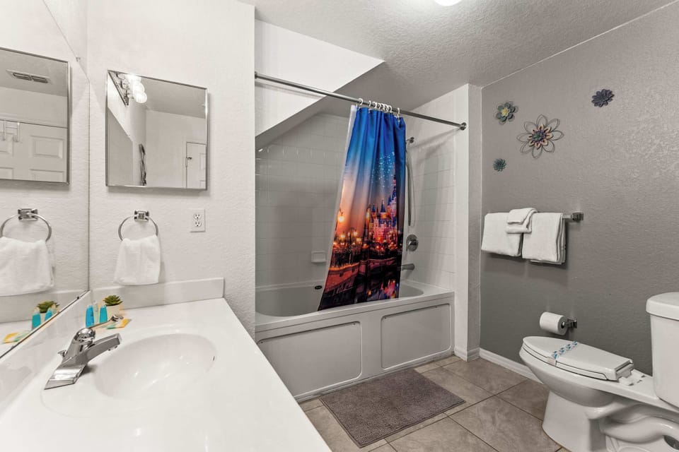 Private ensuite bathroom with a convenient shower/tub combo