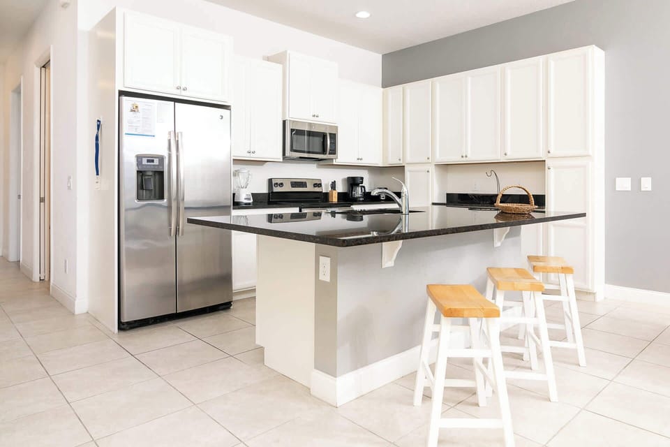 Kitchen with island bar seating