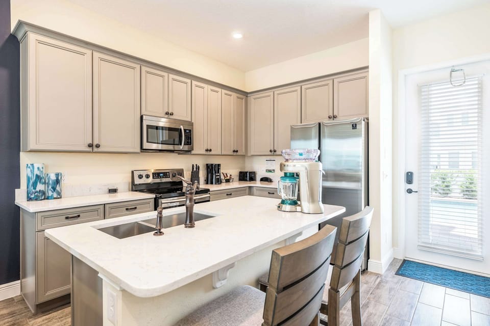 Craft your favorite meals with ease in the fully equipped kitchen