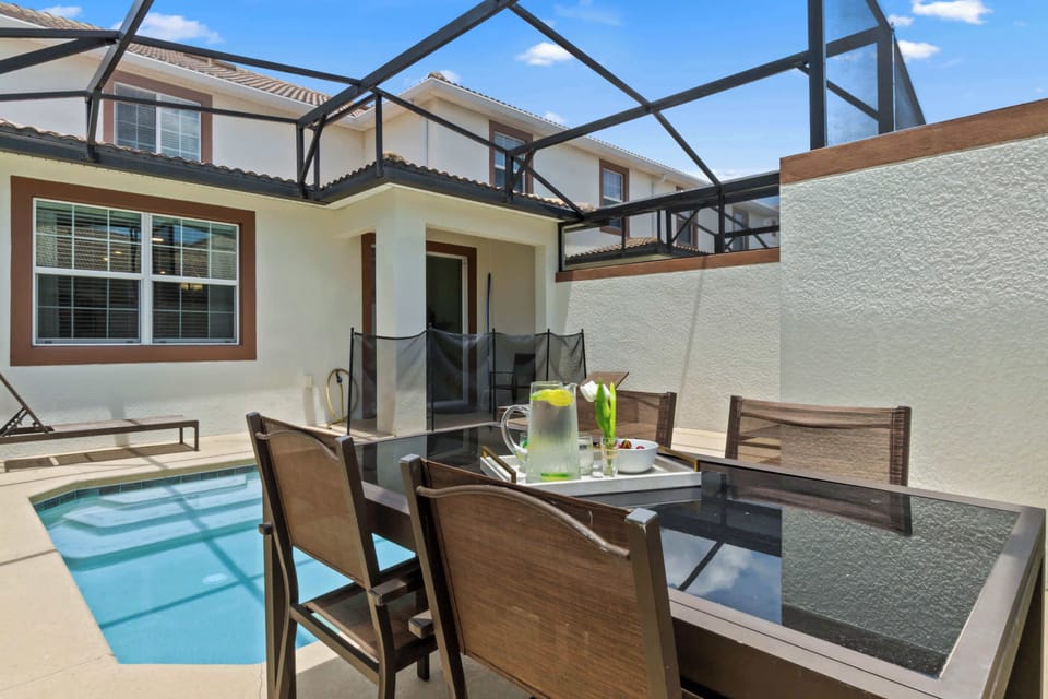 Screened in HEATED Pool with Seating for 4