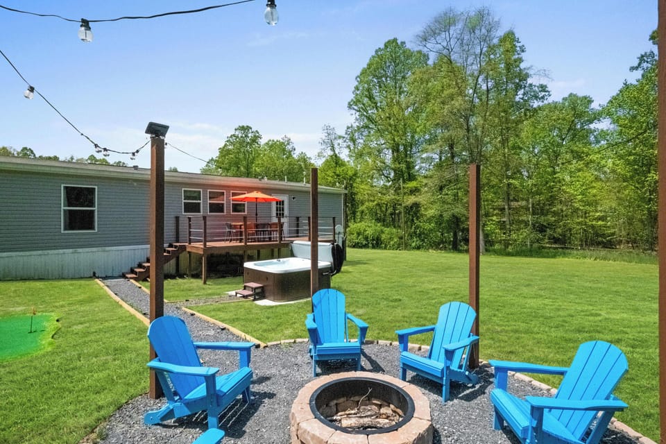 fun backyard: fire pits, hot tub and outdoor dinning space, mini golf 