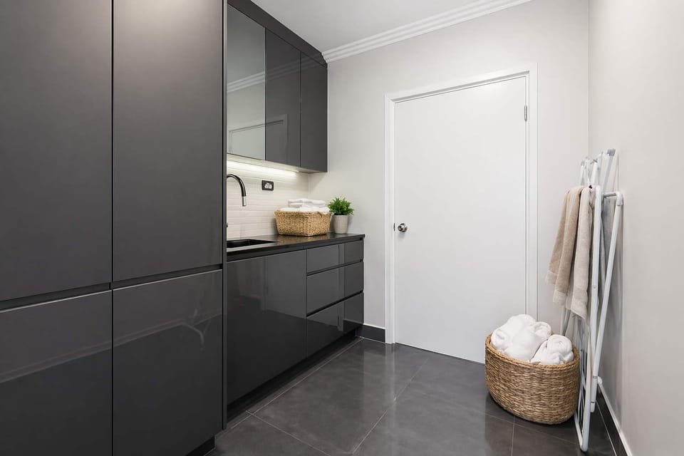 Laundry with washing machine, dryer and storage