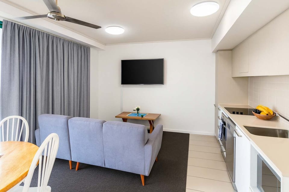 Open-plan living area with TV and seating