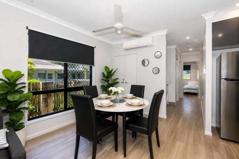 Open Plan Dining and Living Area with Natural Light – Rosslea Townsville Short Stay