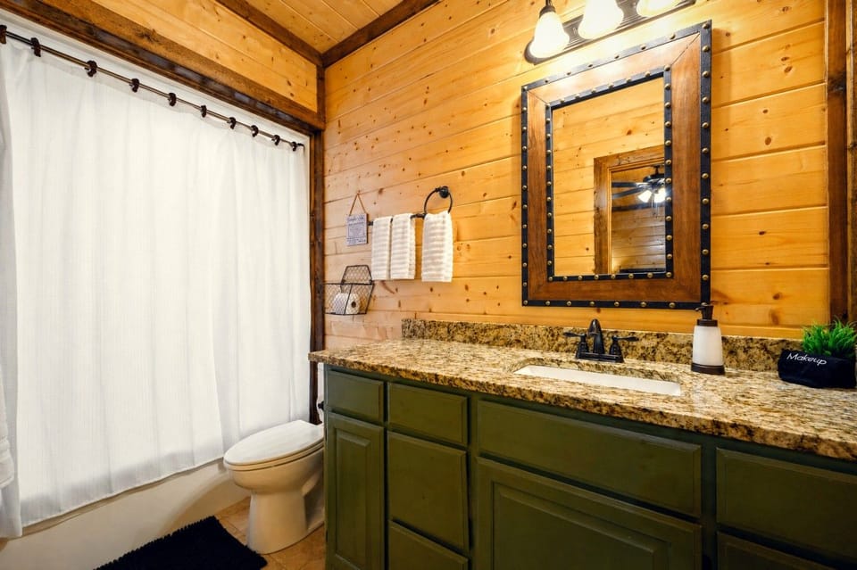 Even the bathrooms feel like a retreat with rustic-chic finishes throughout.