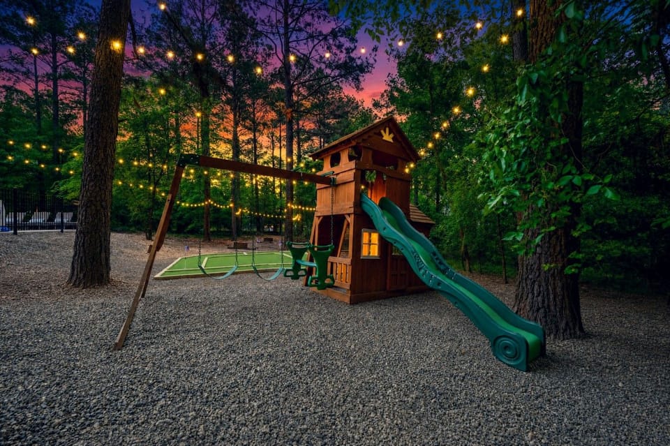 Kids will beg to stay forever once they spot the playhouse glowing under that pink sky.