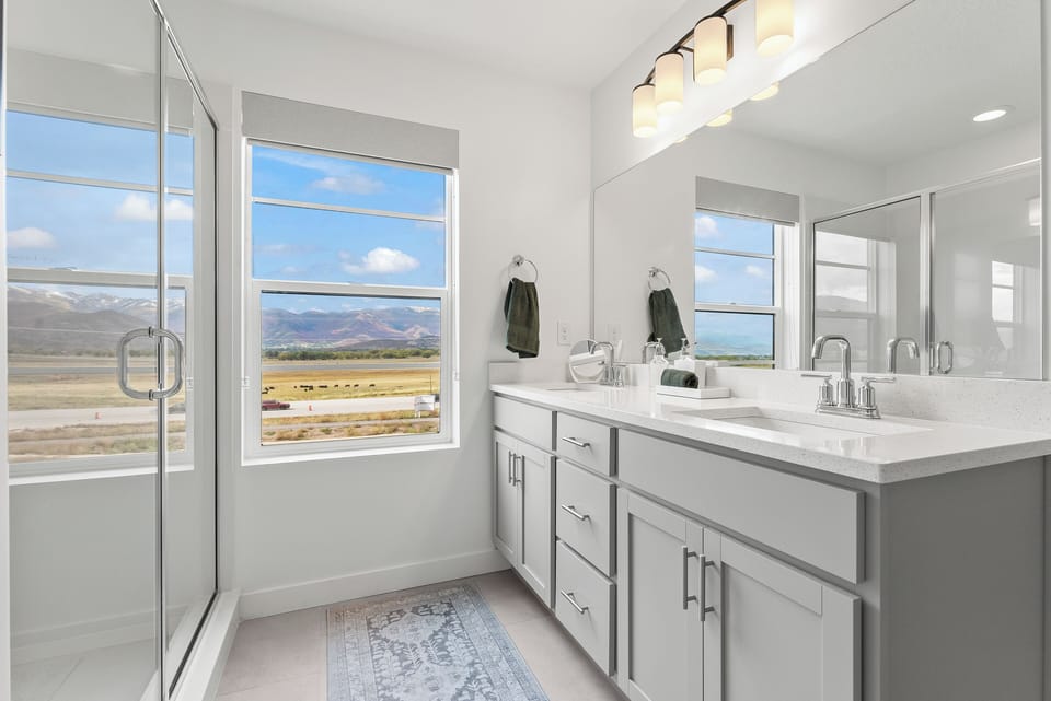 Dual Vanities, Large Glass enclosed shower and large walk in closet.  All bathrooms are stoked with plush towels, high end soaps, shampoos, essentials, hair dryers and more