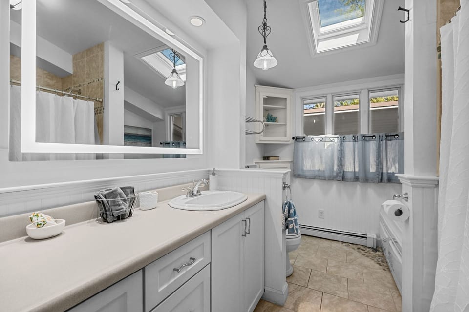 Bathroom 1- Jetted Tub and shower combo- Ensuite to bedroom 1