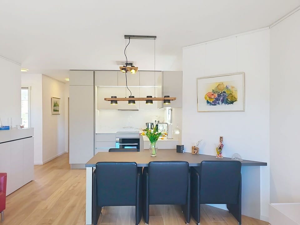 Furniture, Interior Design, Flooring, Light Fixture, Wall, Chair, Ceiling, Wood, Floor, Table