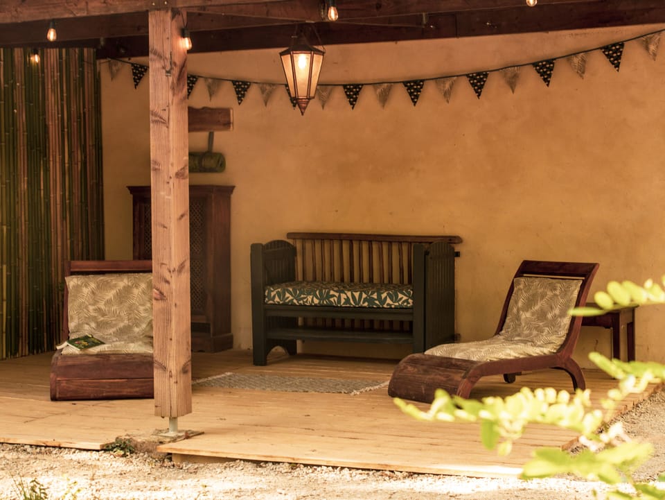Outdoor chill zone looking out over our woodland