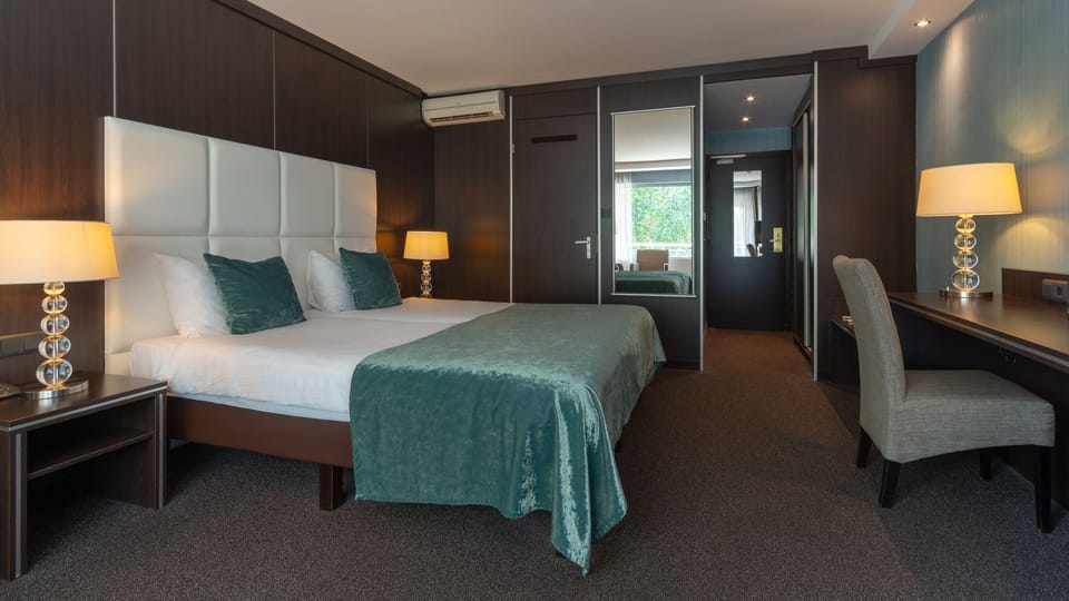 Triple Room | Premium bedding, in-room safe, desk, blackout drapes