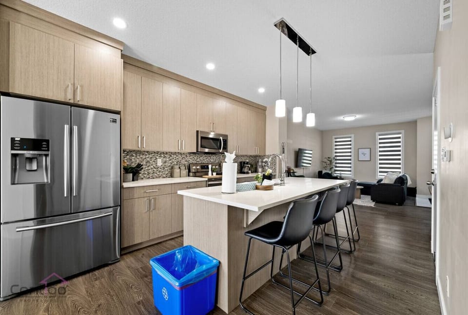 Enjoy our fully equipped kitchen featuring a convenient island.