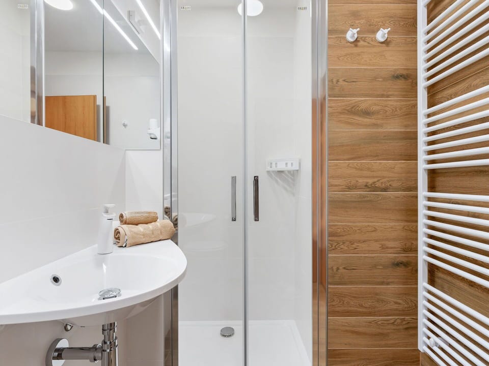 Bathroom, Plumbing Fixture, Flooring, Wall, Interior Design, Floor, Wood, Bathroom Sink, Bathroom Cabinet, Sink