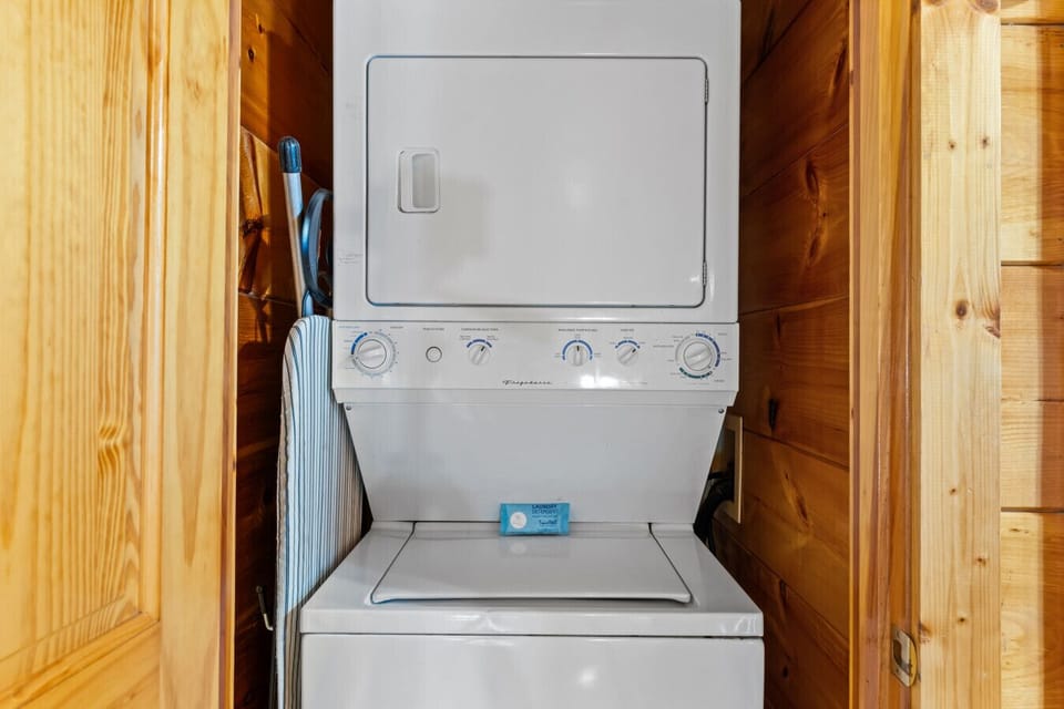 Keep things fresh during longer stays with the convenience of in-cabin laundry—tucked neatly away, but ready when you need it.