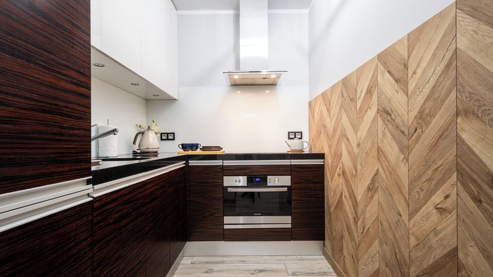Apartment (A703) | Private kitchen | Fridge, stovetop, electric kettle, cookware/dishes/utensils