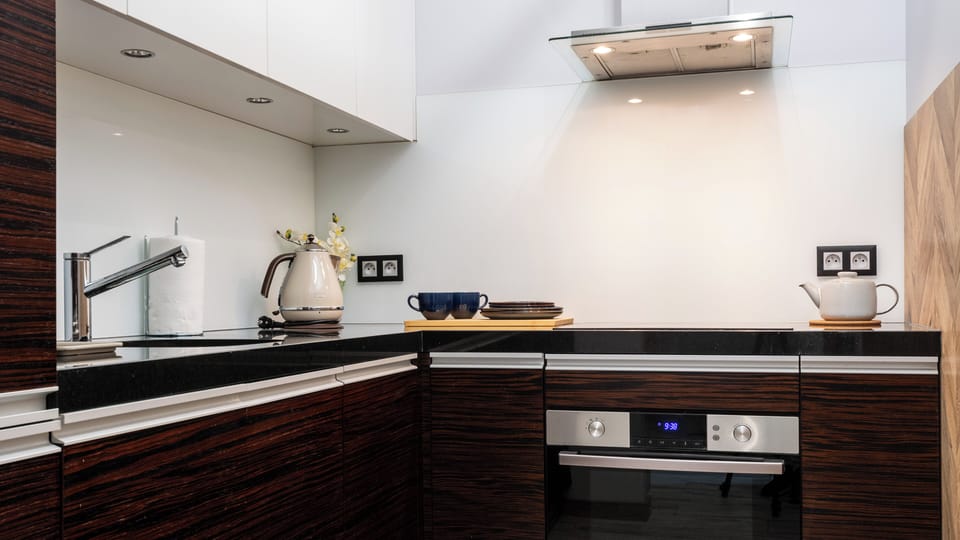 Apartment (A703) | Private kitchen | Fridge, stovetop, electric kettle, cookware/dishes/utensils