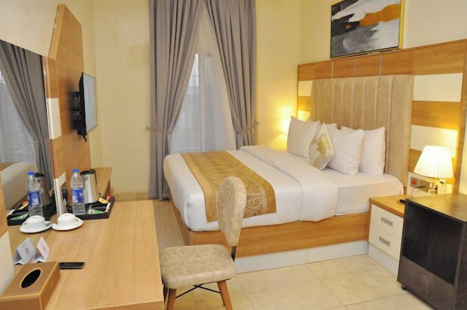 Junior Room, Balcony, City View | Desk, laptop workspace, blackout drapes, soundproofing