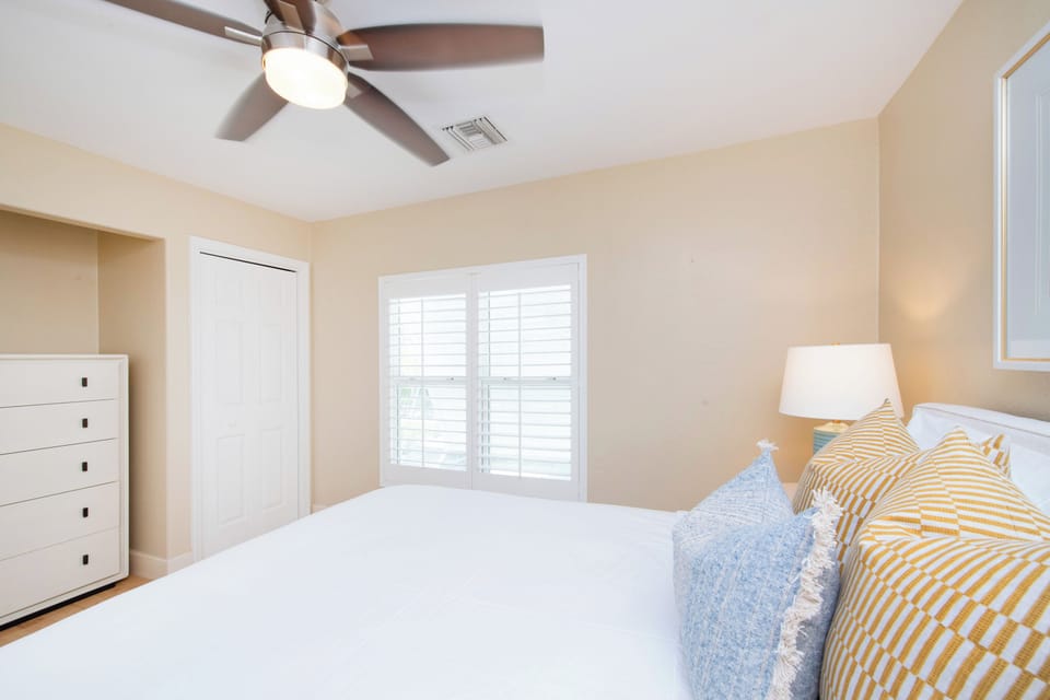 Bedroom with clothing storage.