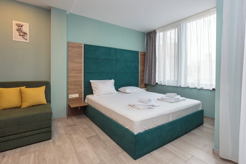 Deluxe Double Room, Balcony | Laptop workspace, cribs/infant beds, free WiFi, bed sheets