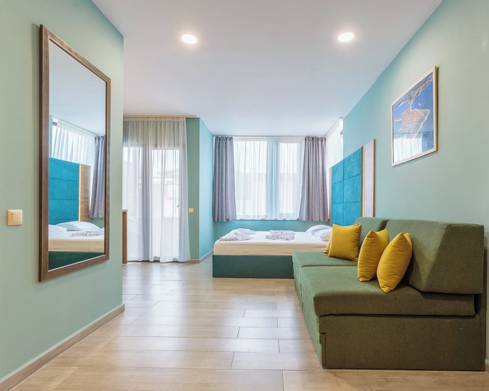 Deluxe Double Room, Balcony | Laptop workspace, cribs/infant beds, free WiFi, bed sheets