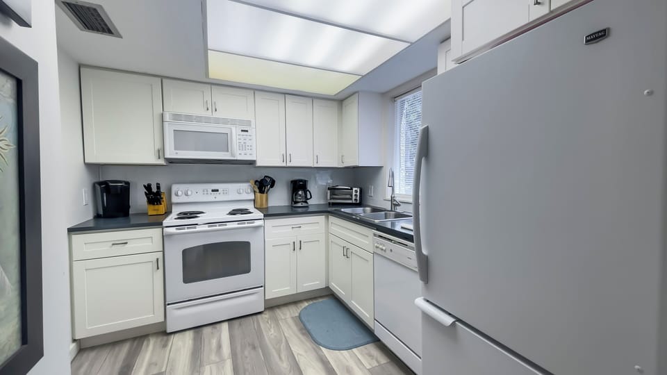 Villa, Multiple Beds, Kitchen, Garden View (825 Ketch Court) | Private kitchen | Coffee/tea maker, dining tables