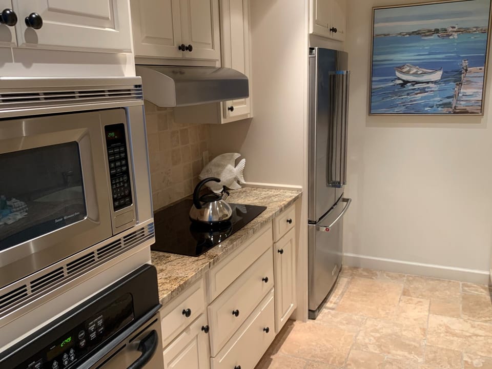 Villa, 1 King Bed with Sofa bed, Kitchen (1021 Caravel Court) | Private kitchen | Coffee/tea maker, dining tables