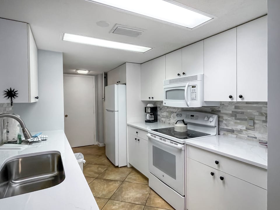 Villa, Multiple Beds, Kitchen, Garden View (1404 South Beach Villas) | Private kitchen | Coffee/tea maker, dining table