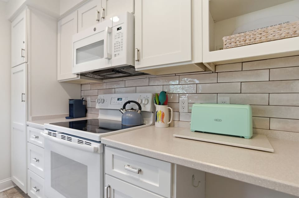Villa, Multiple Beds, Kitchen, Pool View (2410 Lighthouse Tennis) | Private kitchen | Coffee/tea maker, dining table