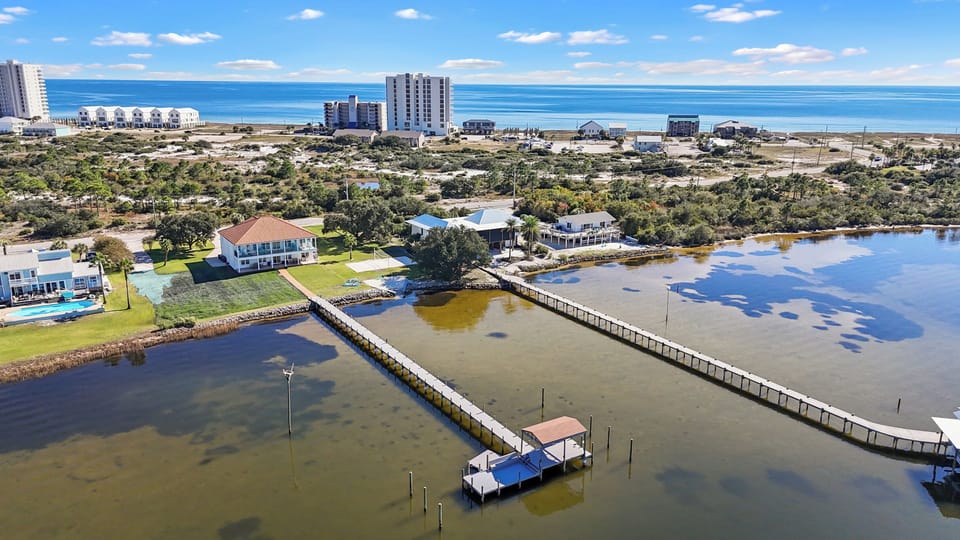 Private dock with fish cleaning station and multiple boat parking spots.