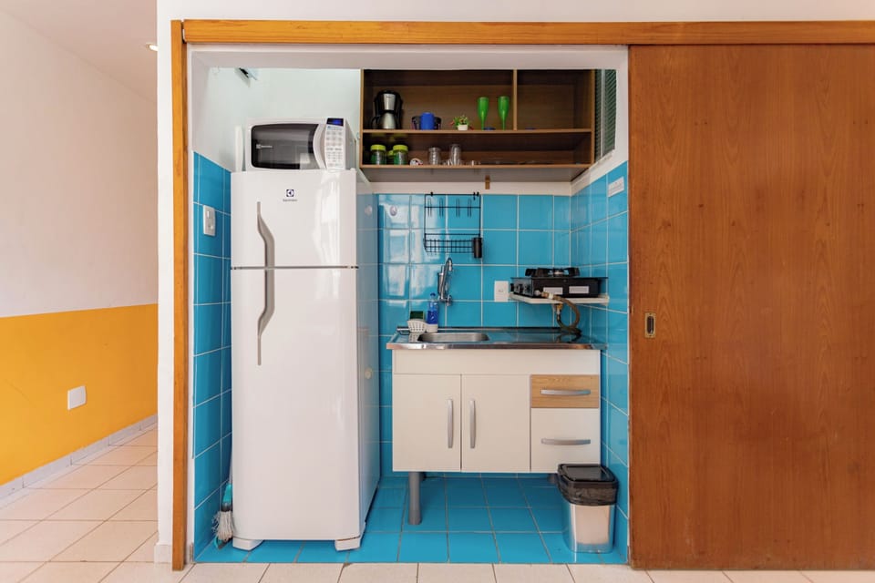Apartment | Private kitchen | Fridge, microwave, stovetop, cookware/dishes/utensils