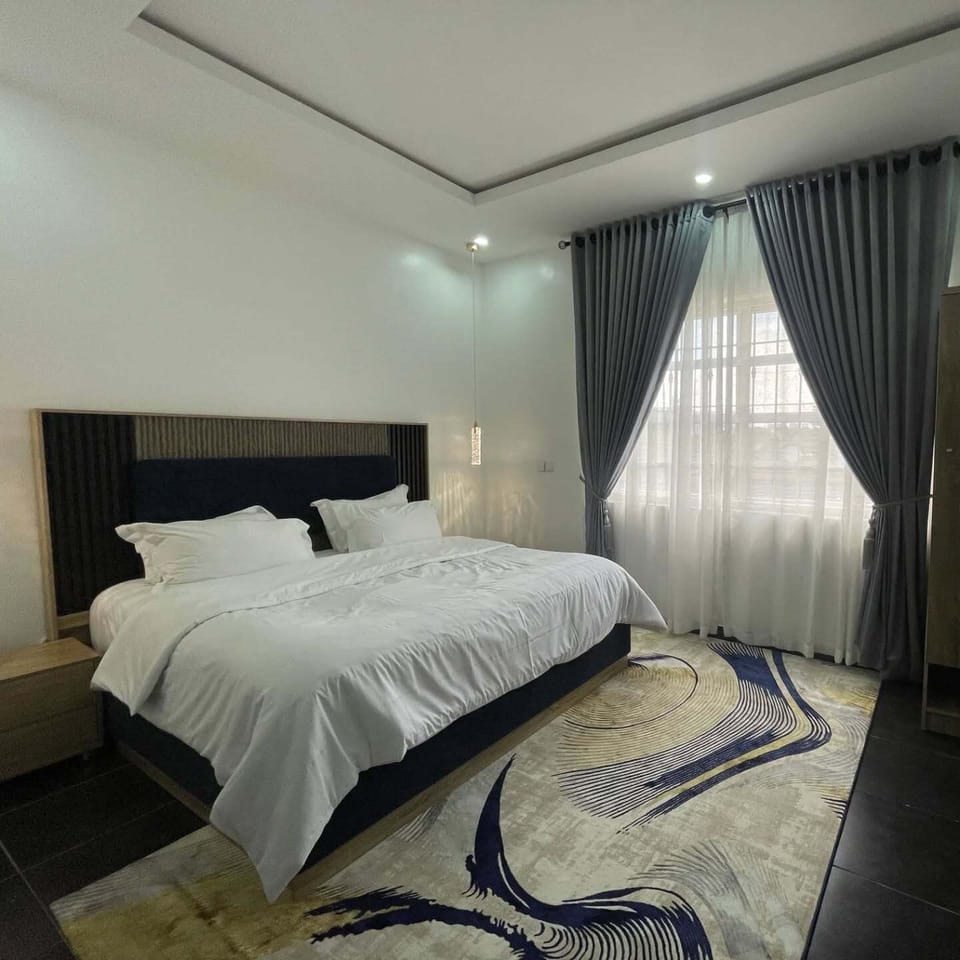 Deluxe Room, Balcony, City View | Desk, laptop workspace, blackout drapes, soundproofing