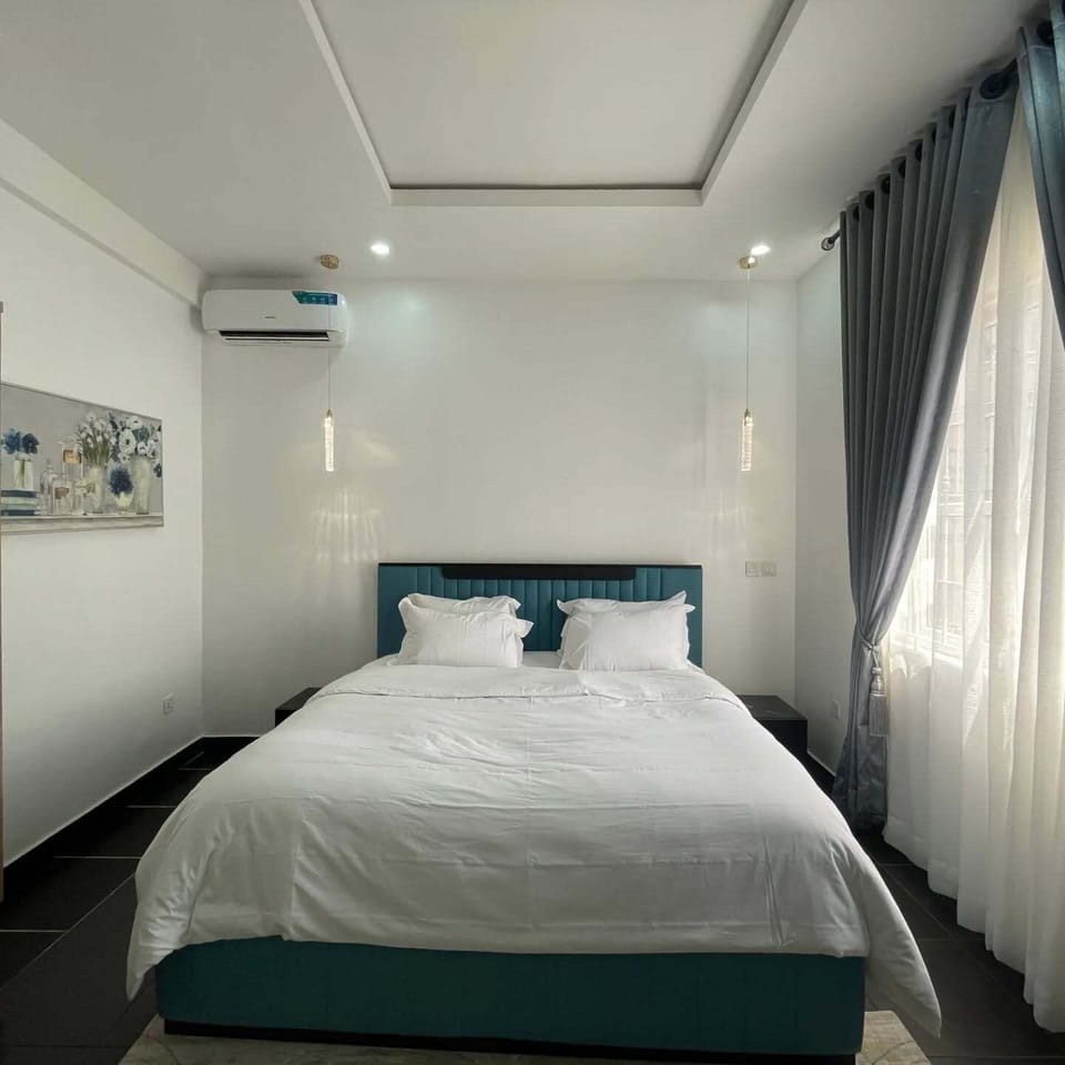 Deluxe Room, Balcony, City View | Desk, laptop workspace, blackout drapes, soundproofing
