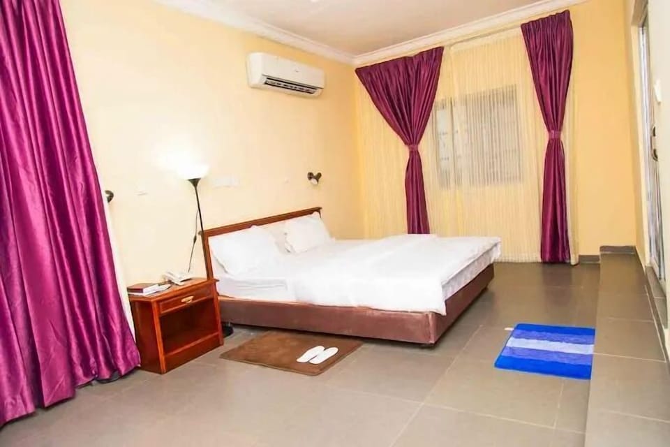 Deluxe Room, Balcony, City View | Desk, laptop workspace, blackout drapes, soundproofing