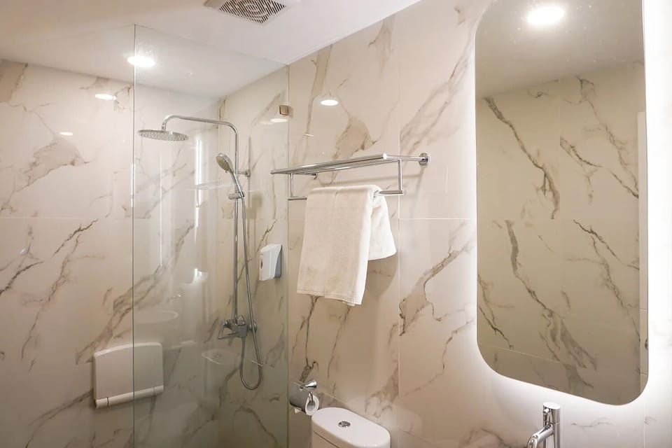 Shower, free toiletries, towels, soap