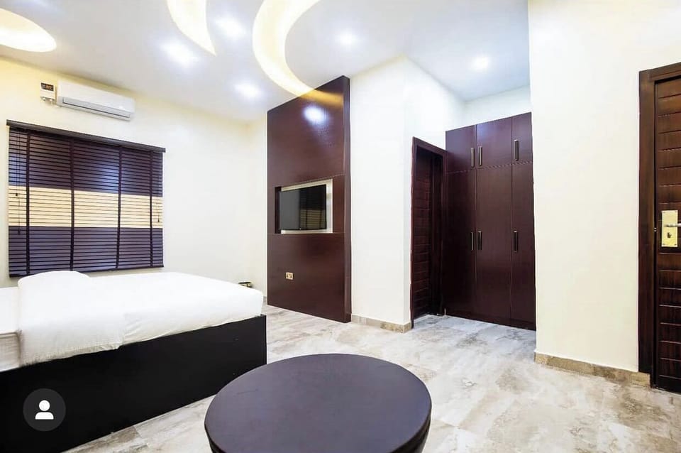 Family Room, Balcony, City View | Desk, laptop workspace, blackout drapes, soundproofing