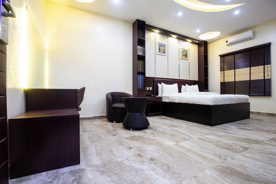 Family Room, Balcony, City View | Desk, laptop workspace, blackout drapes, soundproofing