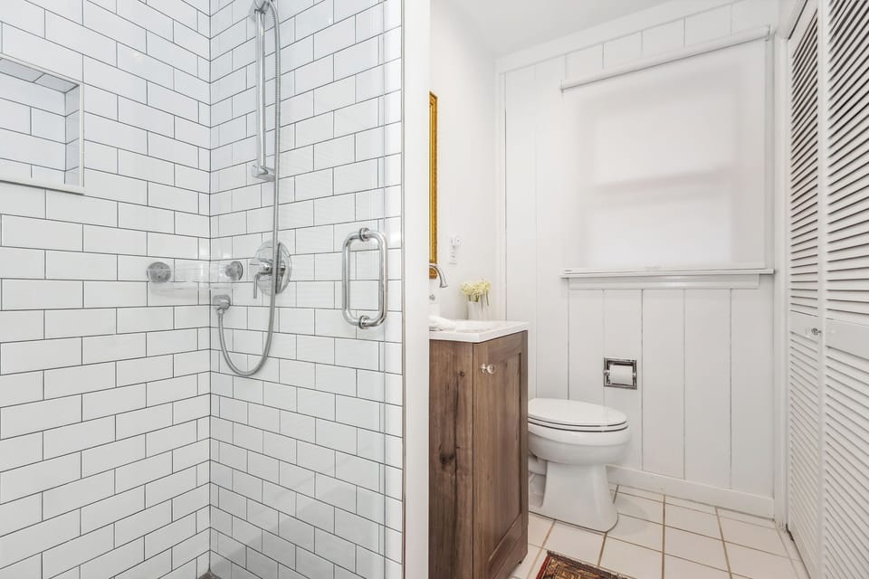 Enjoy the convenience of a stand-up shower in the first-floor bathroom.