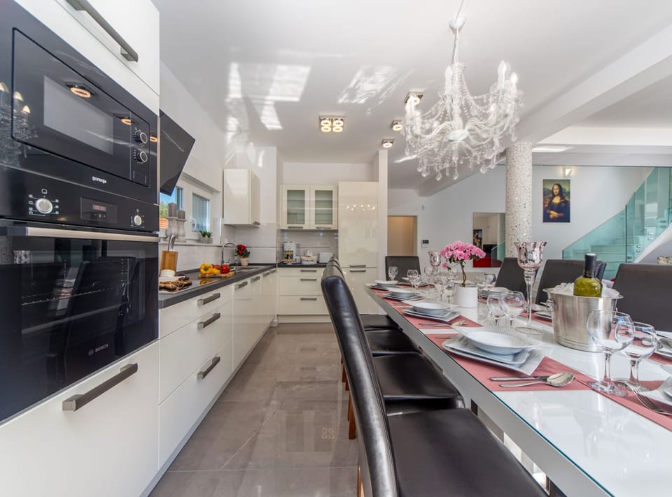 Villa (Five Bedroom Holiday Home with Pool) | Private kitchen | Fridge, cookware/dishes/utensils