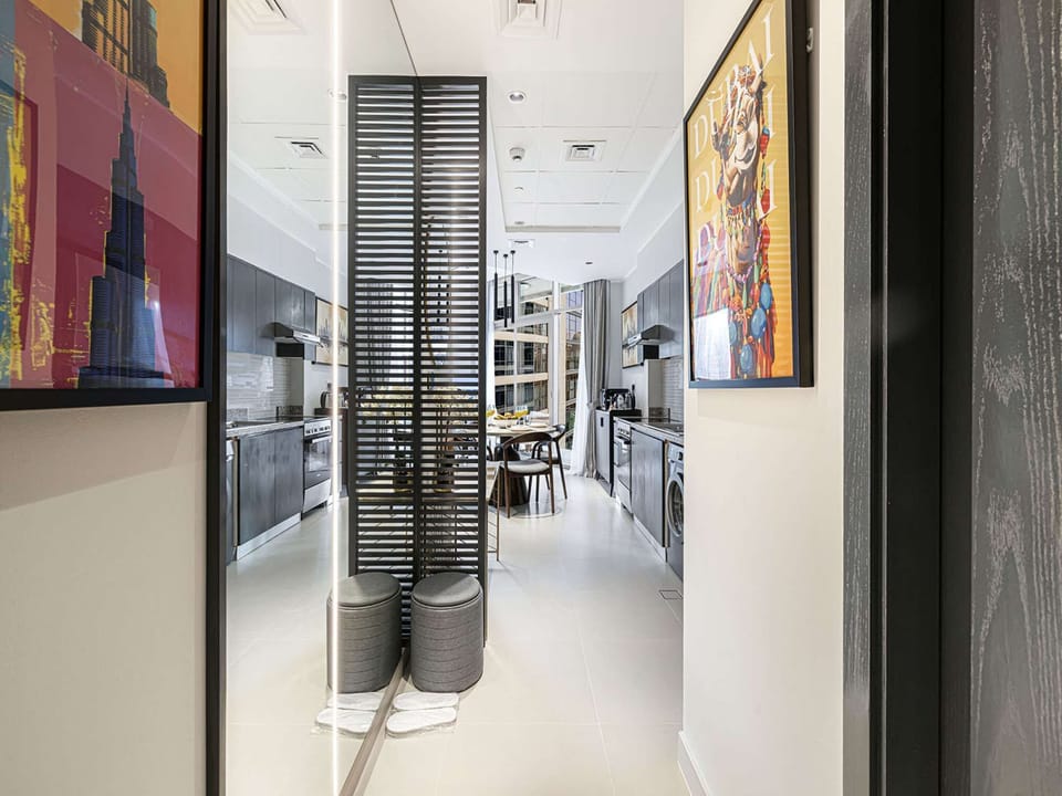 Stylish Foyer Entrance Framed with Iconic Dubai Artwork