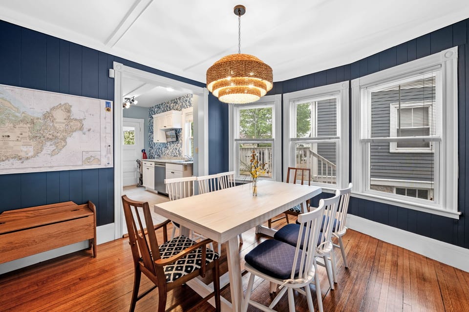 The dining room has seating for everyone with 8 spaces at the table.