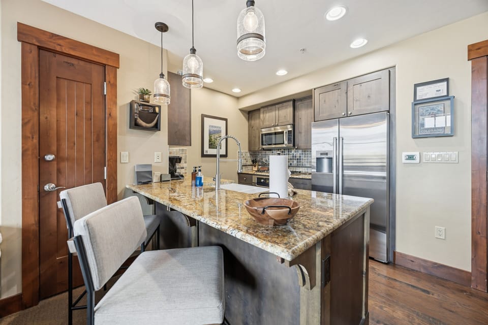 Chef's Kitchen with Granite Island & Bar Seating
