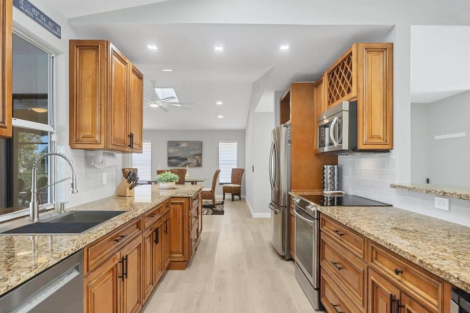 Fully-Equipped kitchen with plenty of counter-top space and new stainless-steel appliances