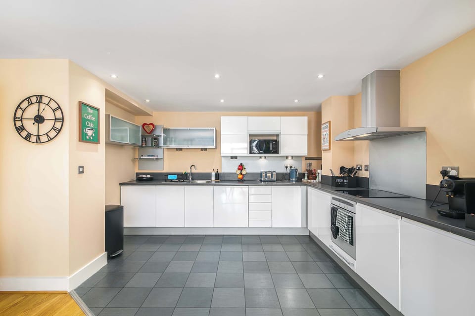 Beautifully designed, fully equipped kitchen featuring a washing machine, dishwasher, microwave, oven, fridge and freezer—everything you need to prepare delicious home-cooked meals with ease