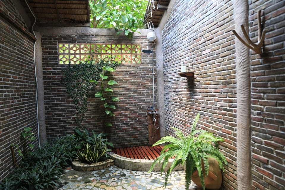 Deluxe Triple Room, Garden View | Bathroom | Slippers, bidet