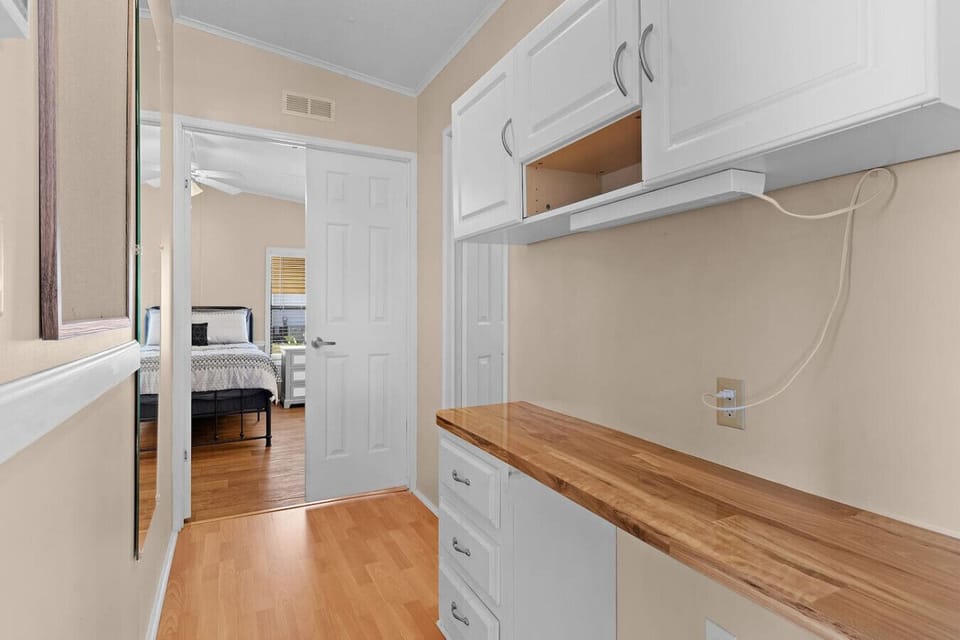 Practical hallway area with additional counter space for your stay.