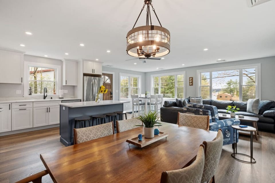 Cook, dine, and relax together in this beautiful open-concept area