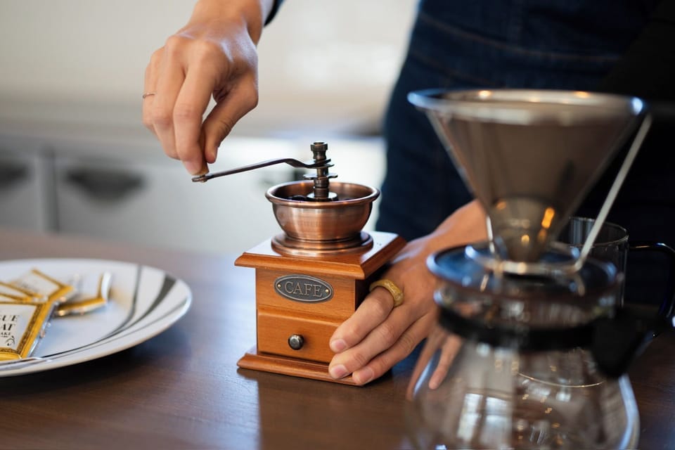 A cup of coffee ground from beans in a coffee mill tastes exceptional.